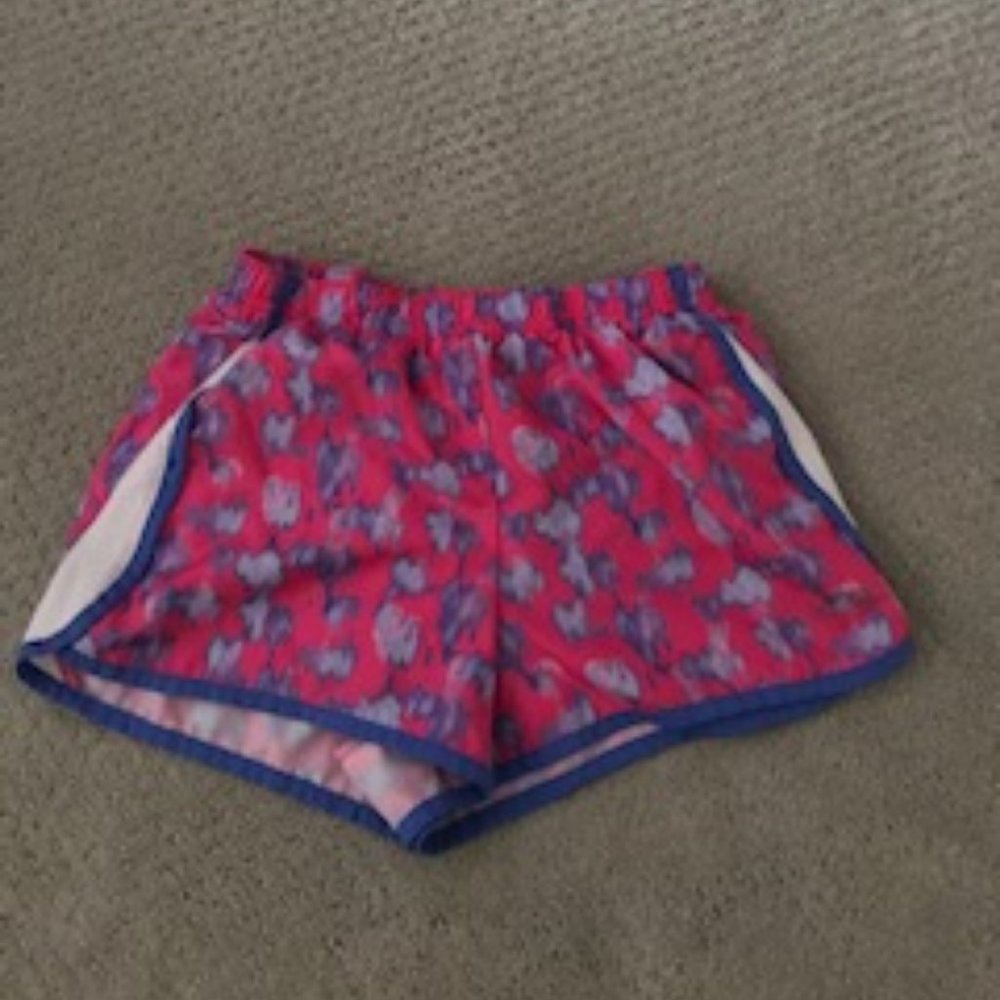blue and  pink athletic shorts